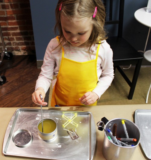 child making candles