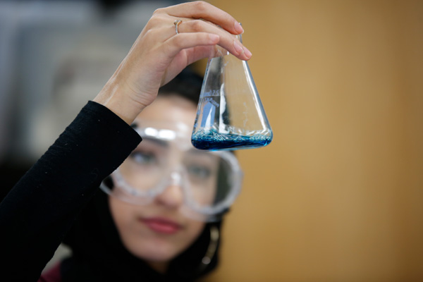 Student working on chemistry at at Charter Public School