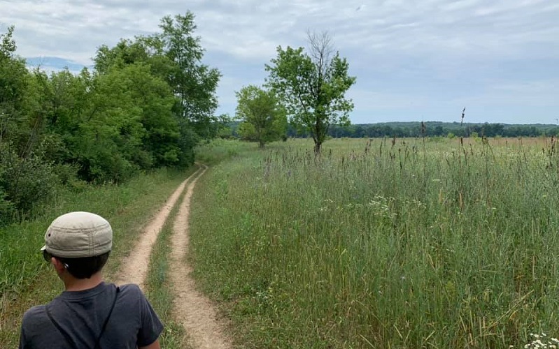 boy hiking Fort Custer Recreation Area